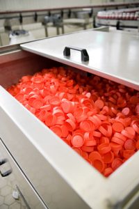 Red lids in a factory